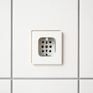 Jak zamontować gniazdko na płytkach