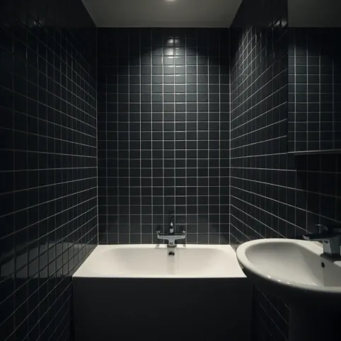 Mała łazienka ciemne płytki